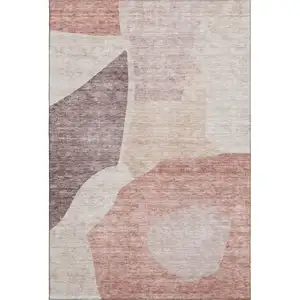 Photo of Blush And Plum Abstract Washable Area Rug With UV Protection