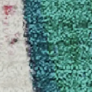 Photo of Blush Blue And Emerald Abstract Washable Area Rug With UV Protection