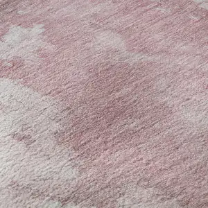 Photo of Blush Blue And Ivory Abstract Washable Area Rug With UV Protection