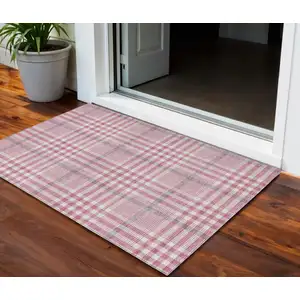 Photo of Blush Gray And Ivory Plaid Washable Indoor Outdoor Area Rug