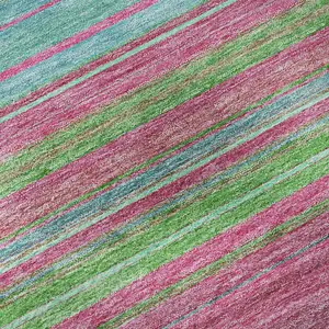 Photo of Blush Green And Blue Striped Washable Area Rug With UV Protection