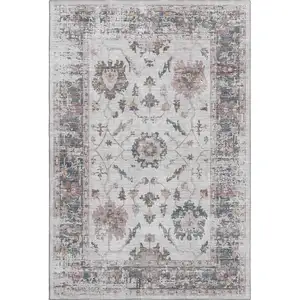 Photo of Blush Ivory And Denim Blue Oriental Washable Area Rug With UV Protection