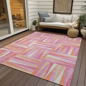 Photo of Blush Ivory And Orange Geometric Washable Indoor Outdoor Area Rug