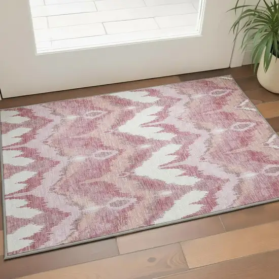 Blush Ivory And Pink Ikat Washable Area Rug With UV Protection Photo 2