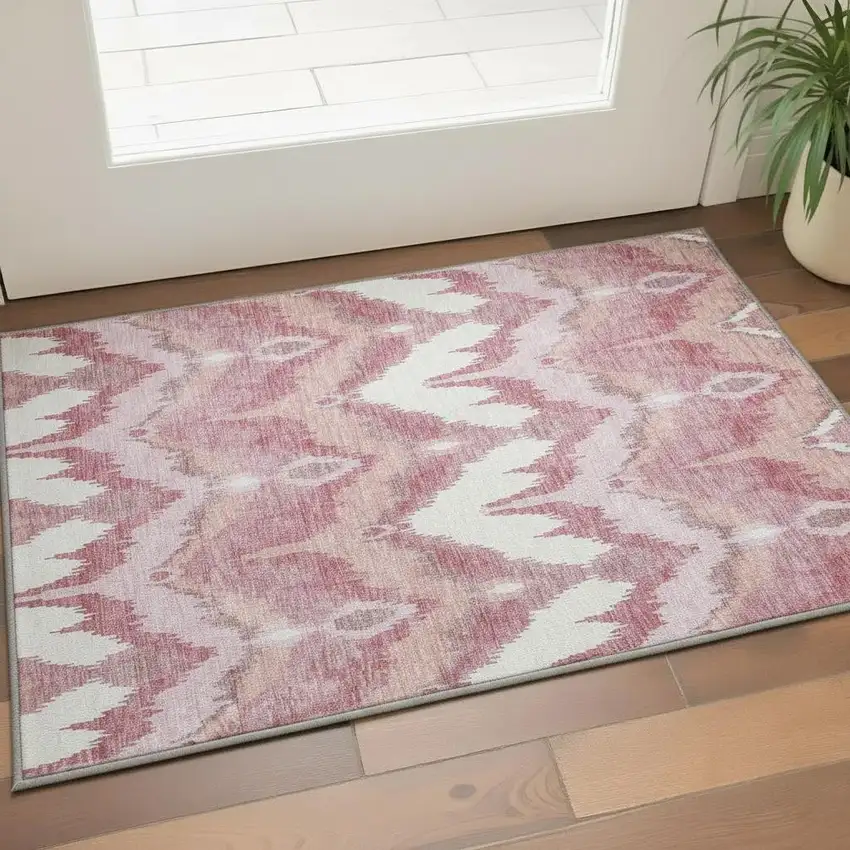 Blush Ivory And Pink Ikat Washable Area Rug With UV Protection Photo 2