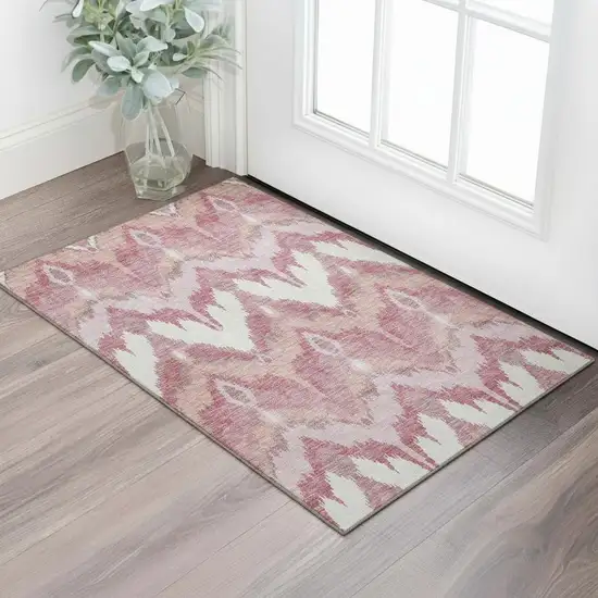 Blush Ivory And Pink Ikat Washable Area Rug With UV Protection Photo 1