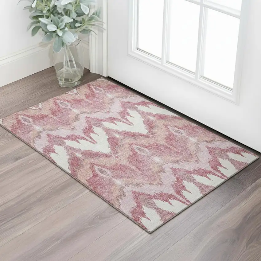 Blush Ivory And Pink Ikat Washable Area Rug With UV Protection Photo 1