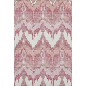 Photo of Blush Ivory And Pink Ikat Washable Area Rug With UV Protection