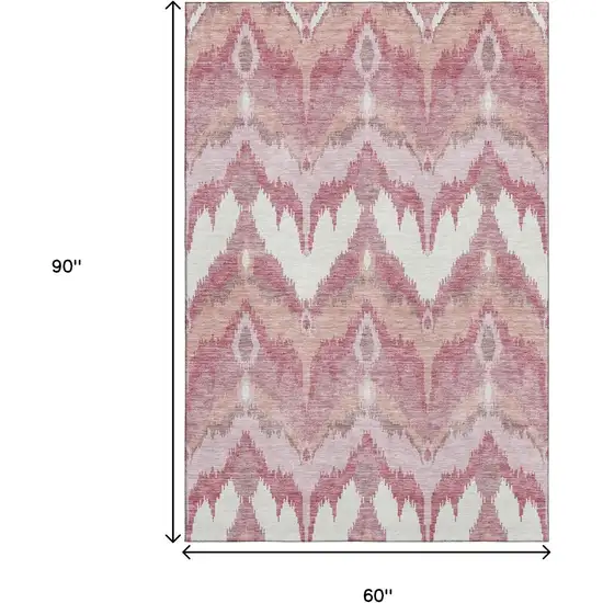 Blush Ivory And Pink Ikat Washable Area Rug With UV Protection Photo 3