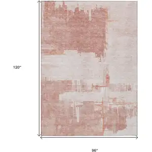 Photo of Blush Mauve And Ivory Abstract Washable Indoor Outdoor Area Rug
