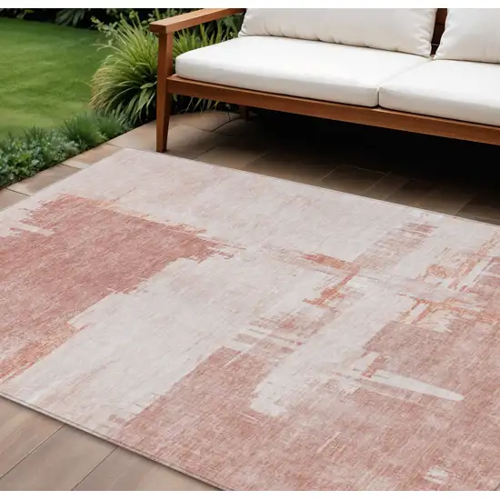 Blush Mauve And Ivory Abstract Washable Indoor Outdoor Area Rug Photo 1