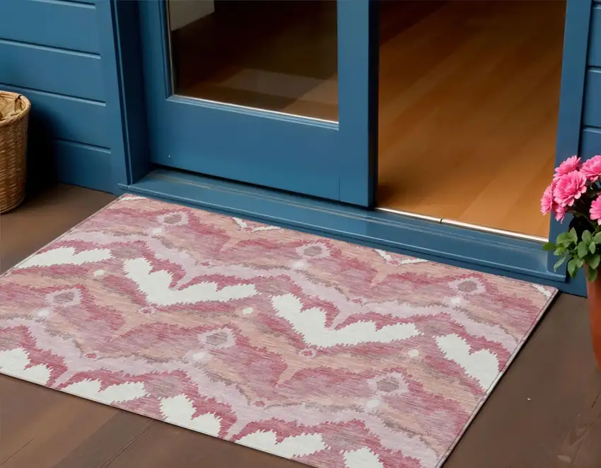 Blush Mauve And Ivory Ikat Washable Indoor Outdoor Area Rug Photo 1