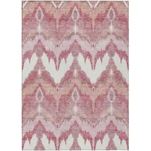 Photo of Blush Mauve And Ivory Ikat Washable Indoor Outdoor Area Rug