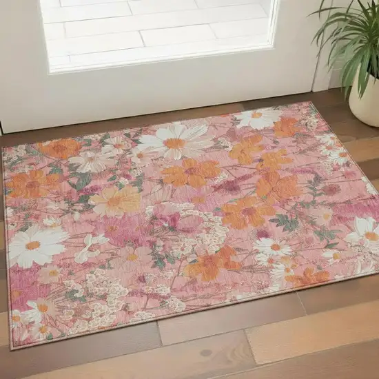 Blush Orange And Ivory Floral Washable Area Rug With UV Protection Photo 1