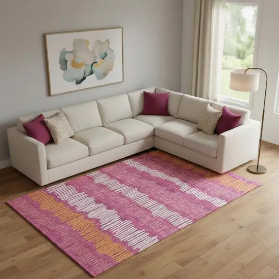 Blush Orange And Ivory Striped Washable Area Rug With UV Protection Photo 1