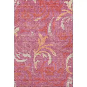 Photo of Blush Orange And Red Floral Washable Area Rug With UV Protection