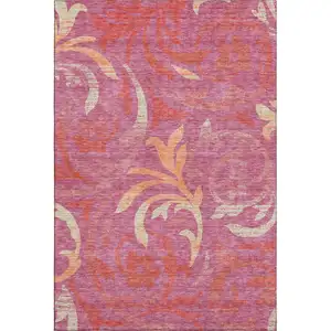 Photo of Blush Orange And Red Floral Washable Area Rug With UV Protection
