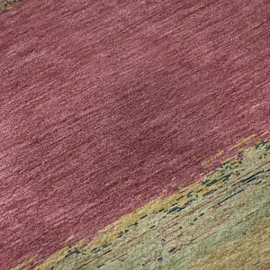 Photo of Blush Orange And Teal Abstract Washable Area Rug With UV Protection