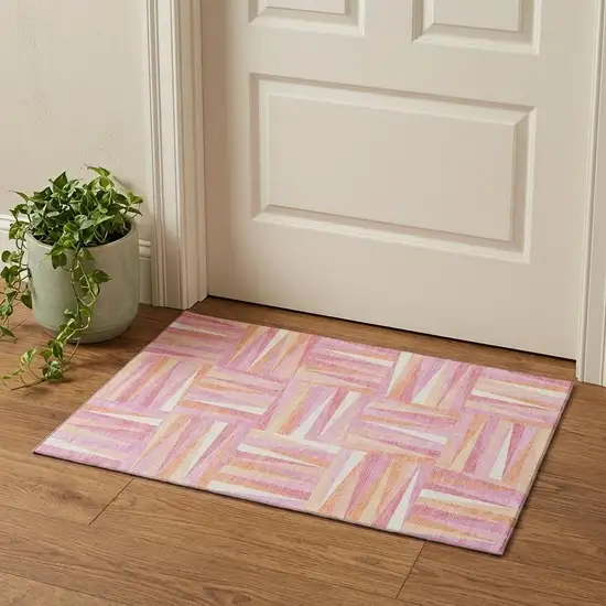Blush Peach And Ivory Geometric Washable Area Rug With UV Protection Photo 1