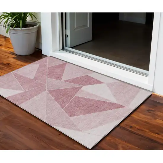 Blush Pink And Ivory Geometric Washable Indoor Outdoor Area Rug Photo 1