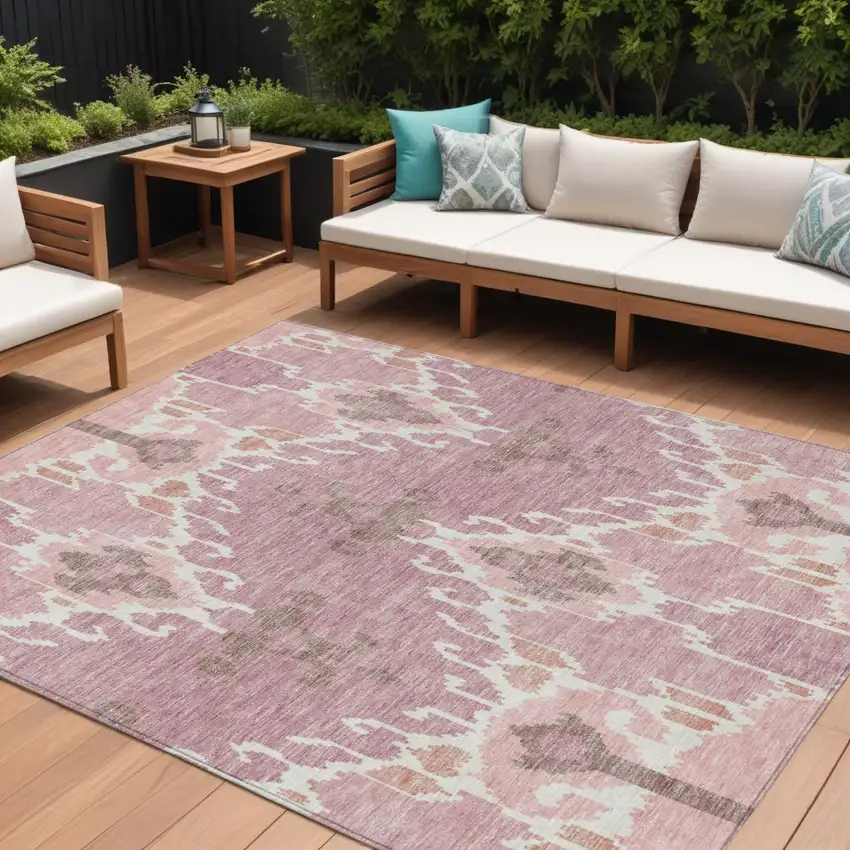 Blush Pink And Ivory Ikat Washable Indoor Outdoor Area Rug Photo 1