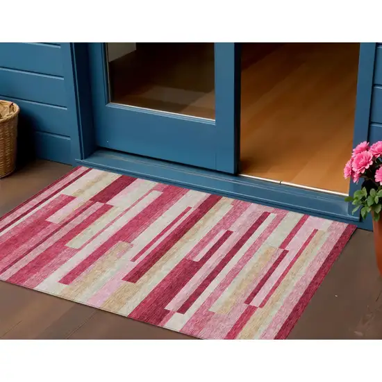 Blush Pink And Mauve Striped Washable Indoor Outdoor Area Rug Photo 1