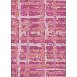 Photo of Blush Pink And Orange Striped Washable Indoor Outdoor Area Rug