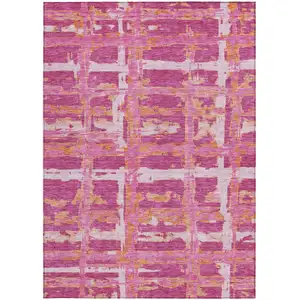 Photo of Blush Pink And Orange Striped Washable Indoor Outdoor Area Rug