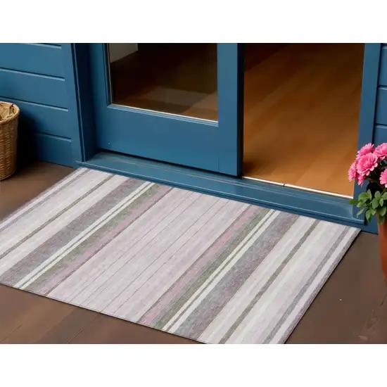 Blush Purple And Ivory Striped Washable Indoor Outdoor Area Rug Photo 1