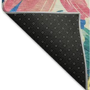 Photo of Blush Yellow And Blue Floral Washable Area Rug With UV Protection