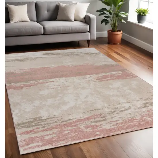 Ivory Beige and Blush Abstract Area Rug Photo 1