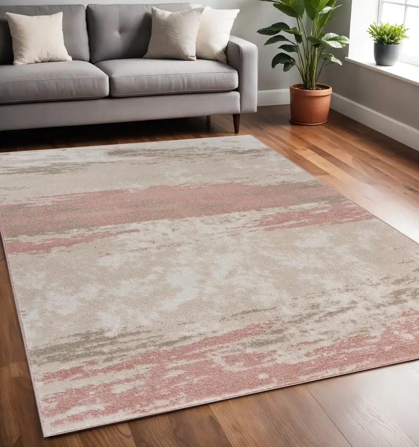 Ivory Beige and Blush Abstract Area Rug Photo 1