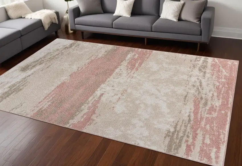 Ivory Beige and Blush Abstract Area Rug Photo 1