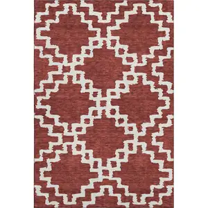 Photo of Brick Red And Ivory Abstract Geometric Washable Area Rug With UV Protection