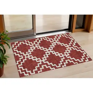 Photo of Brick Red And Ivory Geometric Washable Indoor Outdoor Area Rug