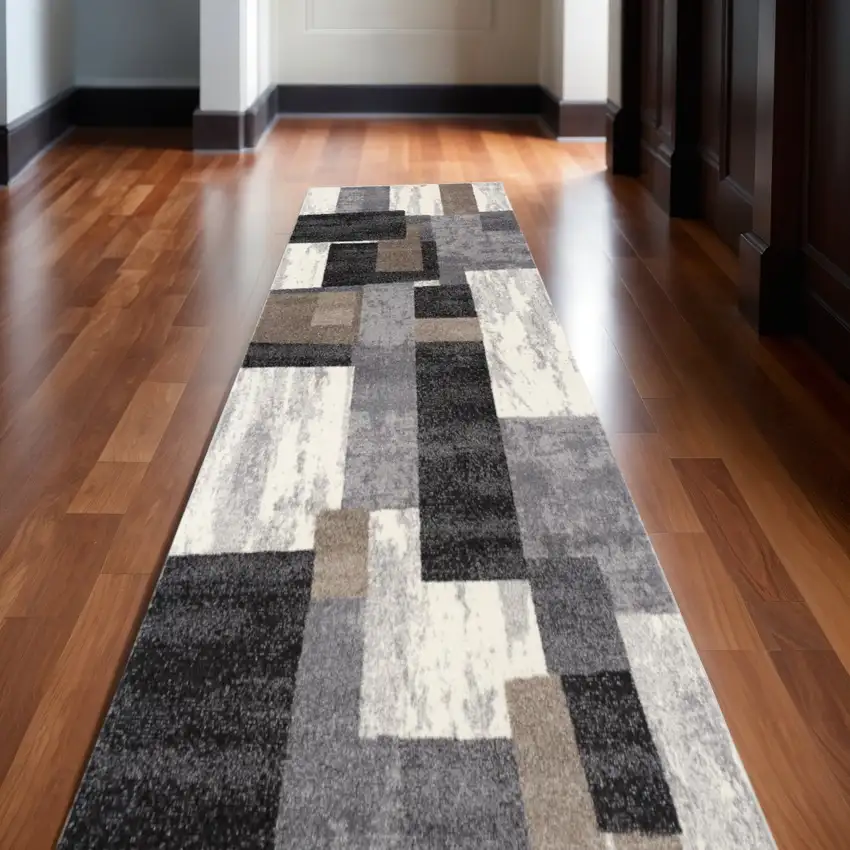 10' Brown And Ivory Geometric Shag Runner Rug Photo 1