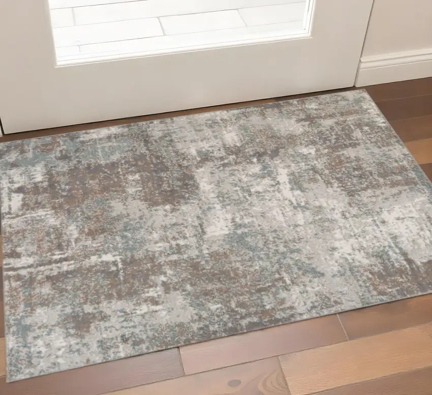 Ivory Brown And Green Abstract Area Rug Photo 1