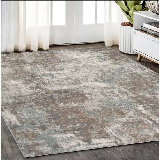 Ivory Brown And Green Abstract Area Rug Photo 1
