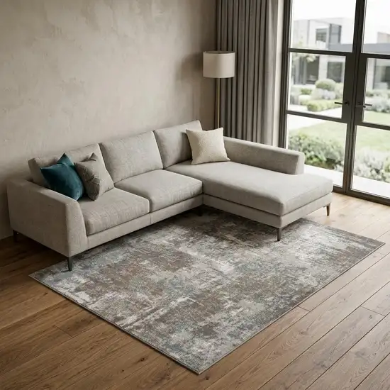 Ivory Brown And Green Abstract Area Rug Photo 1