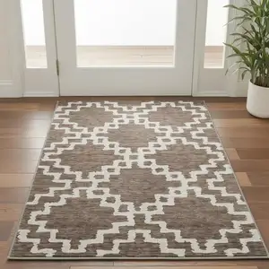 Photo of Brown And Beige Abstract Geometric Washable Area Rug With UV Protection