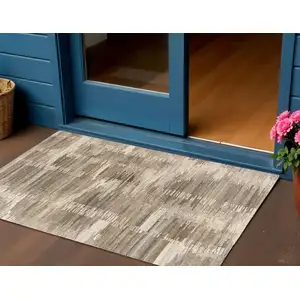 Photo of Brown And Beige Abstract Hand Tufted Square Rug