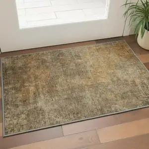 Photo of Brown And Beige Abstract Washable Area Rug With UV Protection