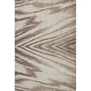 Photo of Brown And Beige Abstract Washable Area Rug With UV Protection