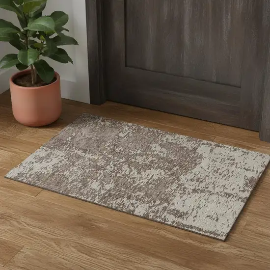 Brown And Beige Abstract Washable Area Rug With UV Protection Photo 1