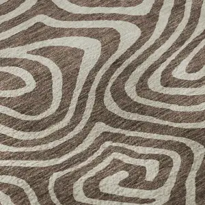 Photo of Brown And Beige Abstract Washable Area Rug With UV Protection
