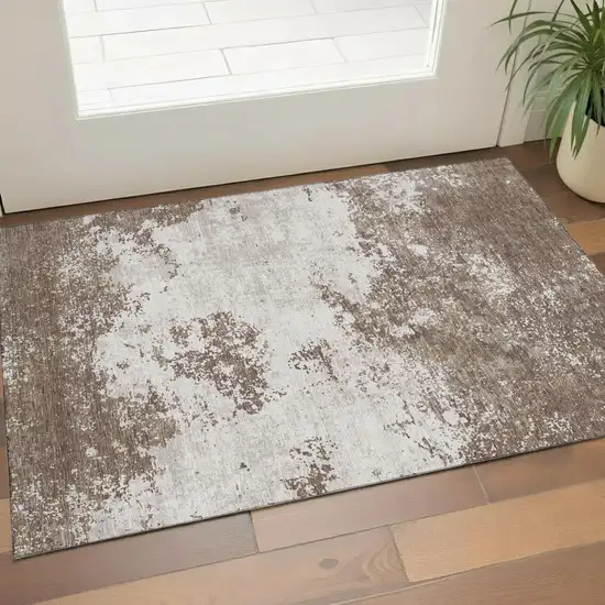 Brown And Beige Abstract Washable Area Rug With UV Protection Photo 1