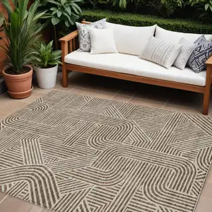 Photo of Brown And Beige Abstract Washable Indoor Outdoor Area Rug