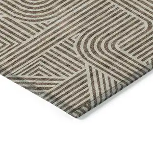 Photo of Brown And Beige Abstract Washable Indoor Outdoor Area Rug