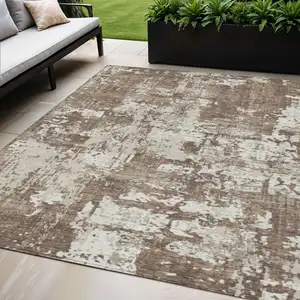 Photo of Brown And Beige Abstract Washable Indoor Outdoor Area Rug