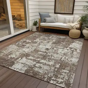 Photo of Brown And Beige Abstract Washable Indoor Outdoor Area Rug
